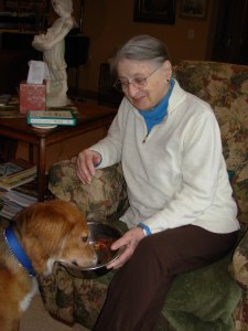 Ann giving Abbey breakfast.