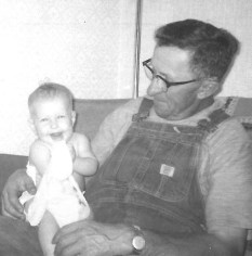 Sitting with his granddaughter, Cindy. 