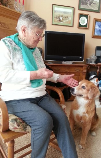 Abbey helping Anna celebrate her birthday