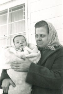 My big brother as a baby being held my Mom