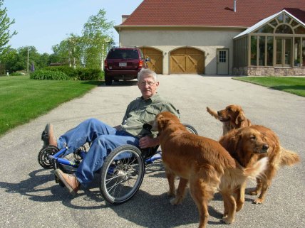 All the dogs get excited when Danny takes his recumbent bike out for a ride.