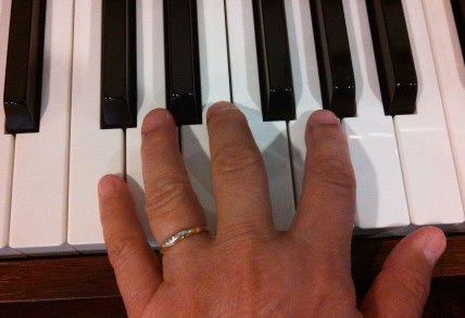 Moms Ring on hand playing piano cropped