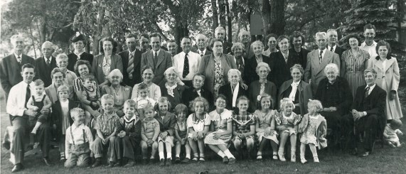 Lots of my relatives - the year before I was born. My brother Danny is sitting on the grass on the right side of the picture - in front of Mom and beside Grandpa.
