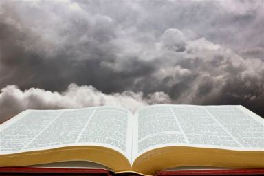Horizontal image of Bible and creation sky