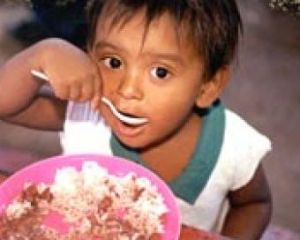 World Vision - girl eating