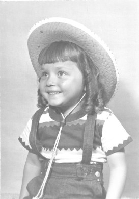 Marian w curls and cowboy hat