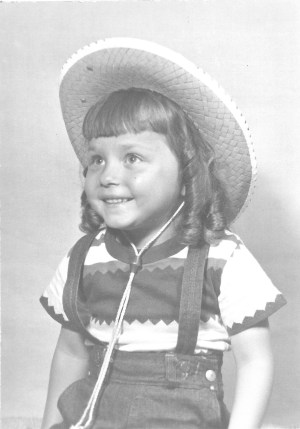 Marian w curls and cowboy hat