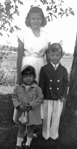 Nancy, Danny, and me dressed up to go to church.