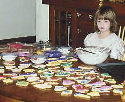Emily w decorated Xmas cookies