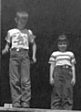 Danny and me looking down from the hay barn - when I was still too short to plant tobacco.
