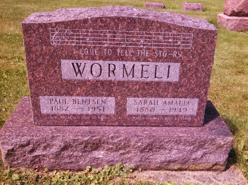 When I went to the cemetery yesterday to take a photo of my parents' tombstone, I wandered through the cemetery. This stone is one of my favorites. It's the parents of my piano and organ teacher. The musical staff on top has the notes and words "I love to tell the story. Below Paul's name is engraved, "Local preacher over 40 years" and below Sarah's name is engraved "Church organist over 50 years."