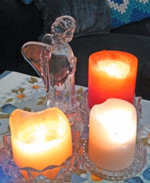 3 candles and angel