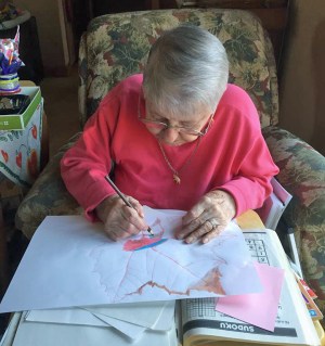Ann coloring the huge leaf she traced on 11x17 paper. She told me she wants to include all the colors of fall in the leaf.