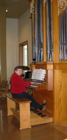 Marian at organ - tall pic